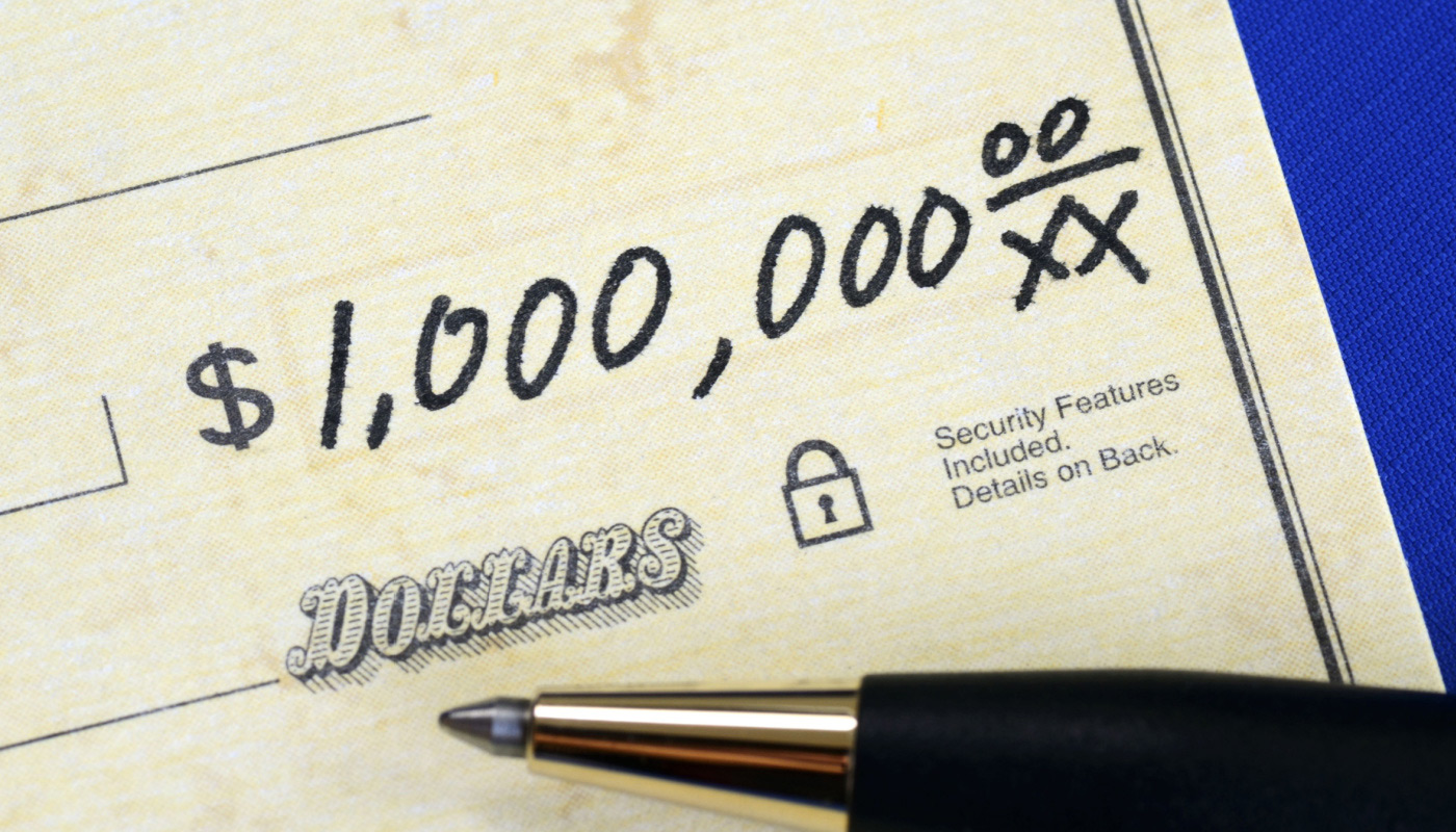 Big Money Millionaire winner receives $1 million check